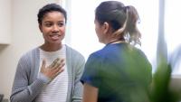 Patient talking to a nurse